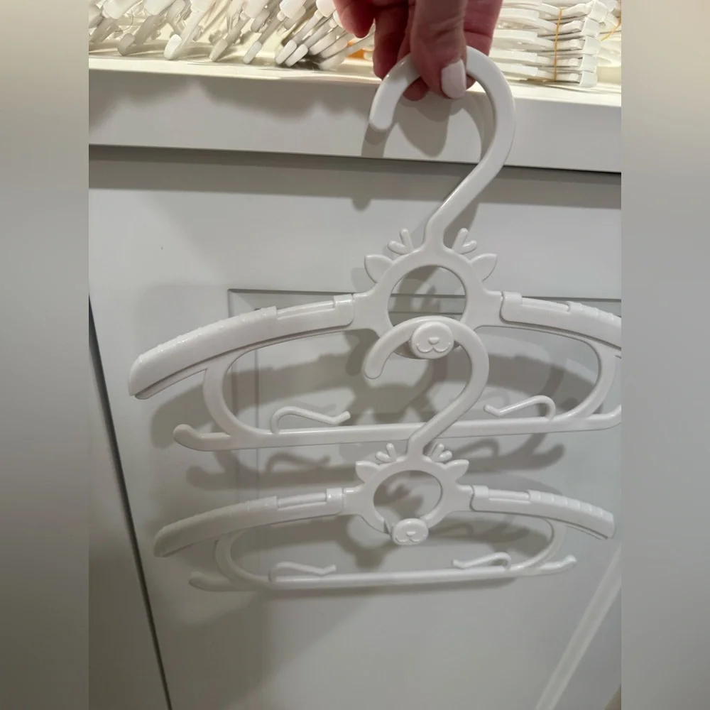 Plastic infant/child adjustable and stackable Hangers with Cute Design